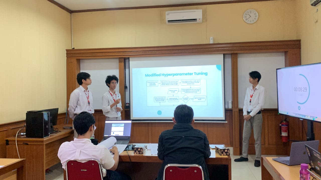 Participants presenting their research at the Paper and Poster Competition